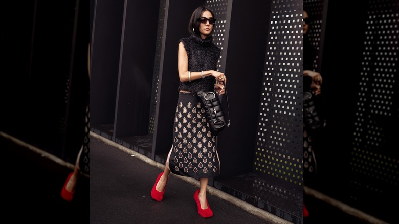 Woman with red fluffy shoes 