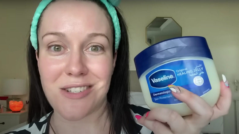 Woman holding vaseline 