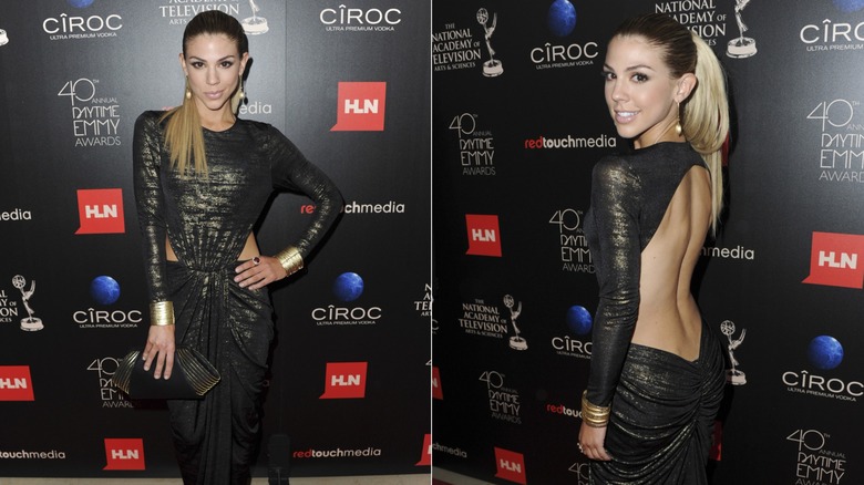 Kate Mansi wearing a gold and black backless dress on the red carpet at the 2013 Daytime Emmy awards