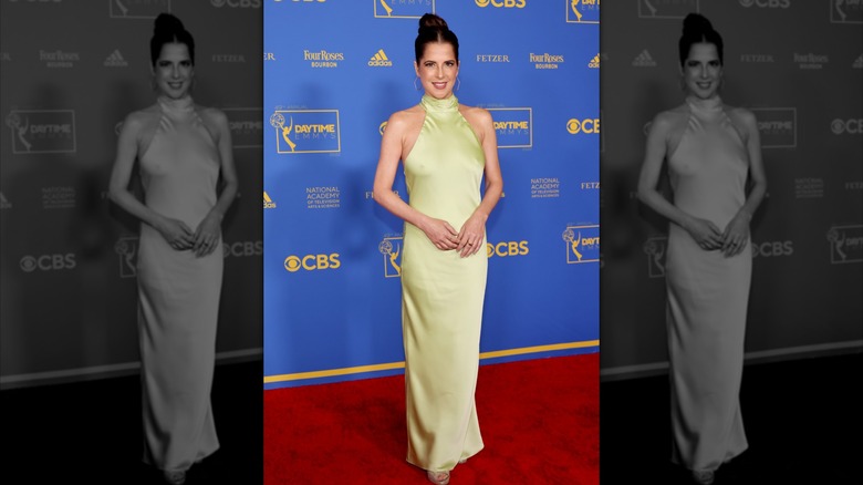 Kelly Monaco smiles on the red carpet in 2022