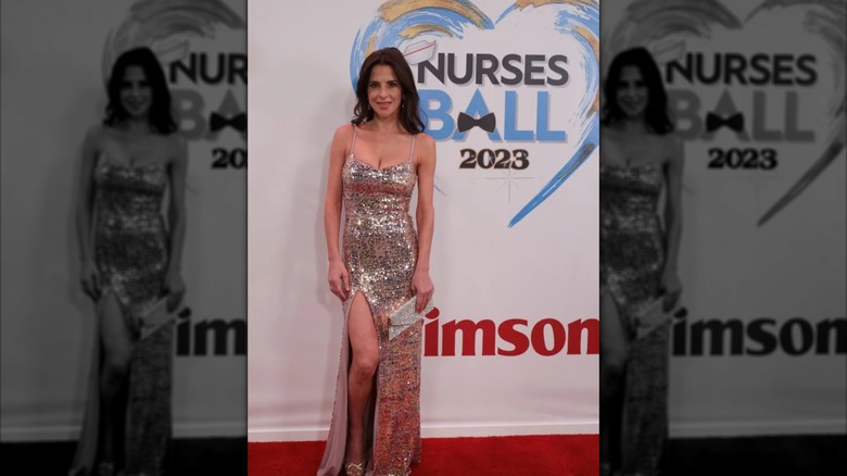 Kelly Monaco smiles on the red carpet in 2023