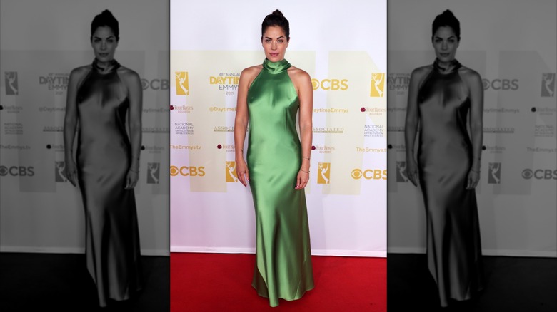 Kelly Thiebaud poses on the red carpet in 2021