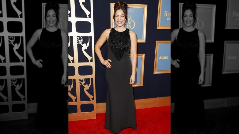 Kelly Thiebaud smiles on the red carpet in 2023