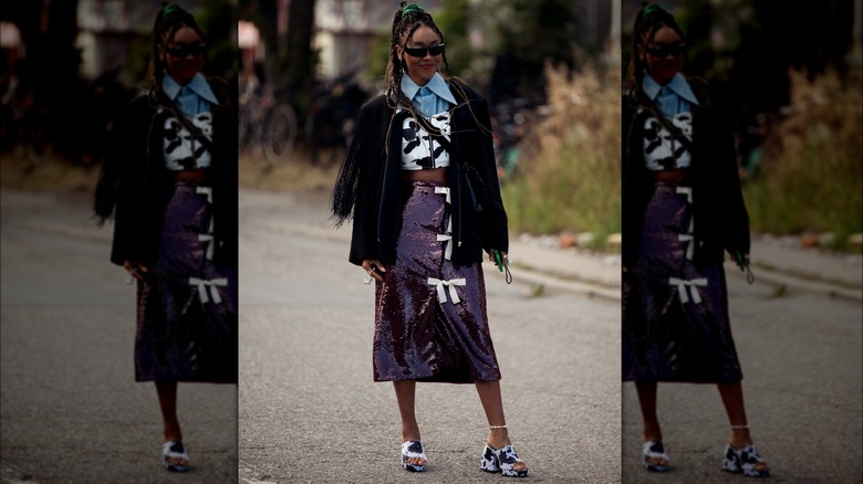 Woman in a glittery skirt 
