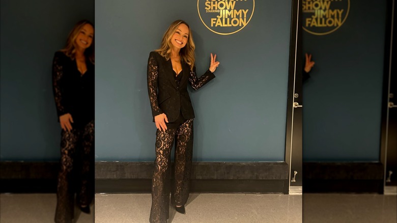 Giada De Laurentiis in a sheer black lace suit on the Jimmy Fallon set