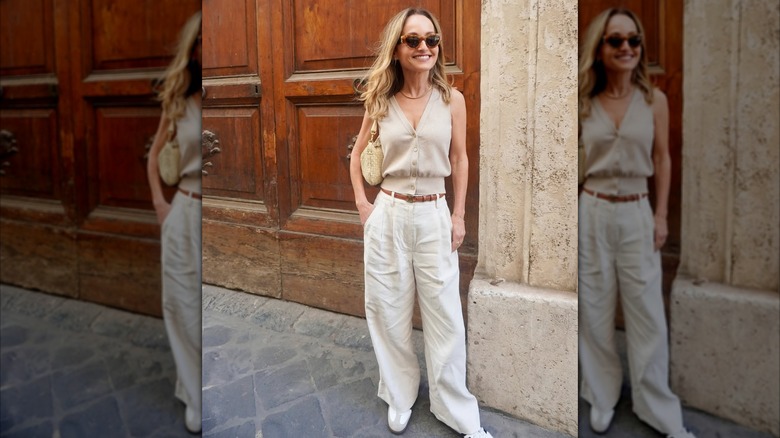 Giada De Laurentiis in Rome in white trousers and a beige vest