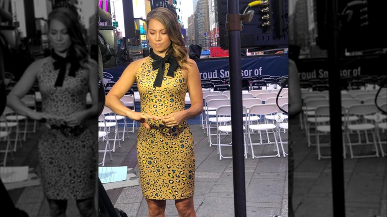 Ginger Zee pictured in 2021 looking at her nails