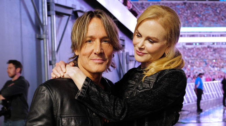 Keith Urban with Nicole Kidman at an arena