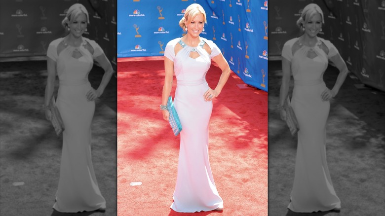 Lara Spencer smiles on the red carpet in 2010