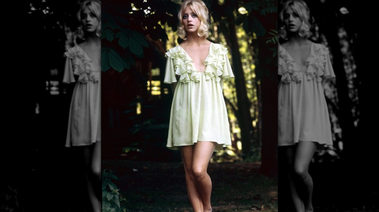 Goldie Hawn pictured in a green dress around 1965.