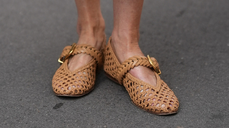 A pair of woven Mary Jane flats