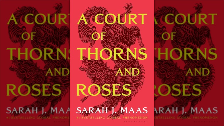 The front cover of A Court of Thorns and Roses by Sarah J. Maas