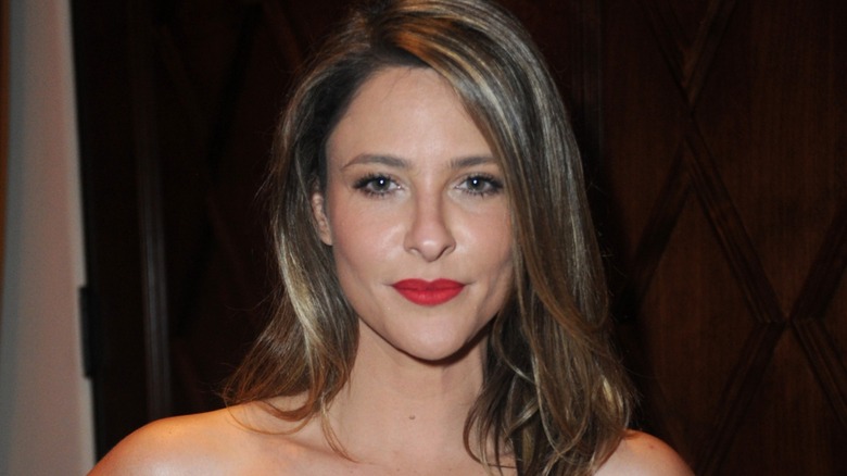 Jill Wagner posing wearing red lipstick