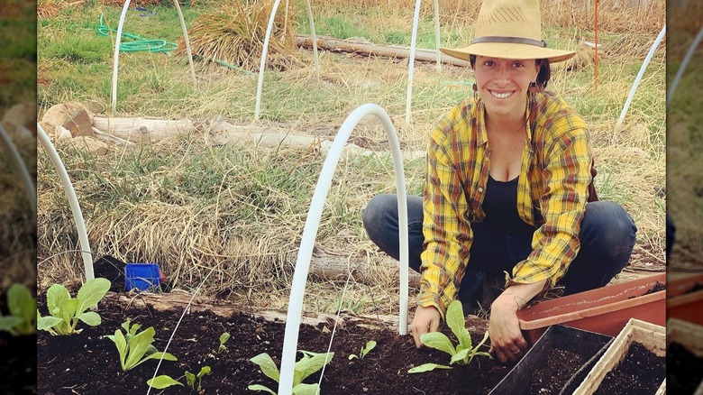 Oona Chaplin tending to a flower bed in 2021