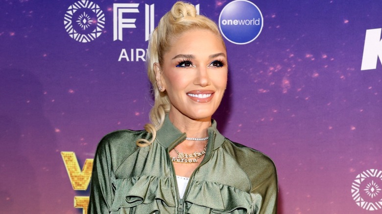 Gwen Stefani smiling on the red carpet