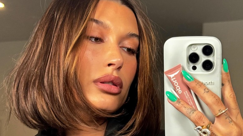 Hailey Bieber taking selfie