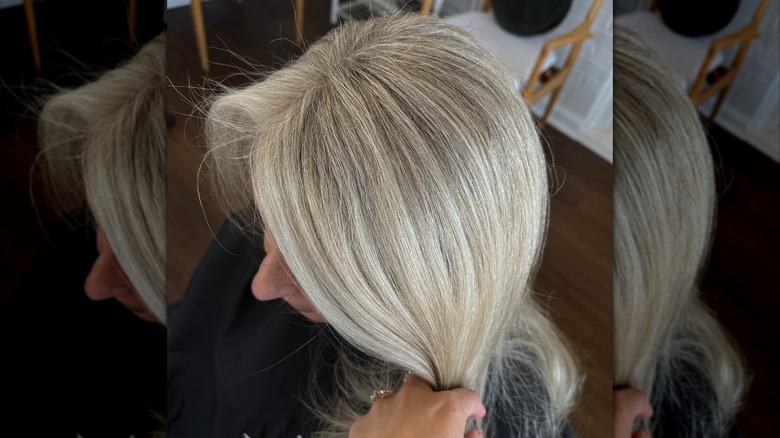 A woman with gray blended hair