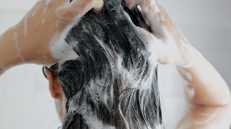 Woman washing her hair 