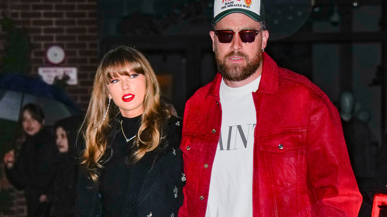 Taylor Swift and Travis Kelce pictured in New York City, with Swift wearing straight-across bangs