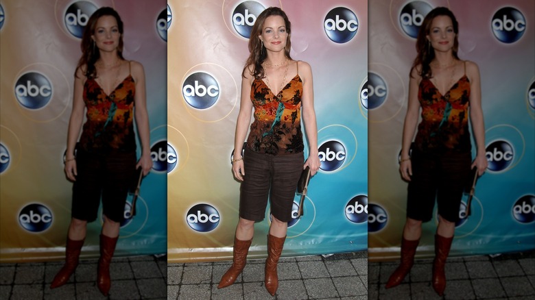 Kimberly Williams-Paisley in boots and shorts