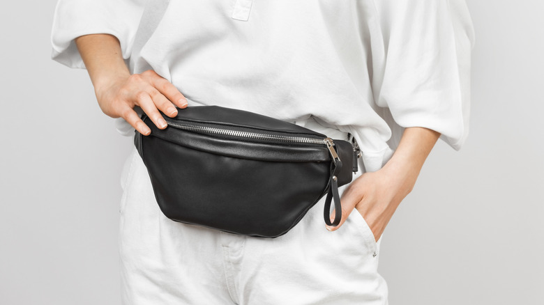 Woman wearing belt bag