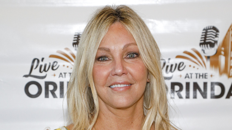 Heather Locklear smiles on the red carpet in 2021