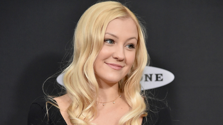 Ava Sambora smiles on the red carpet in 2018