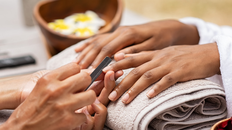 Person getting manicure