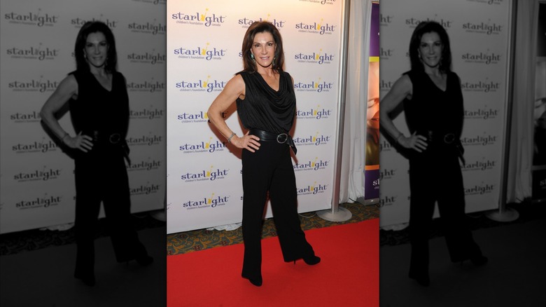 Hilary Farr smiles on the red carpet in 2013