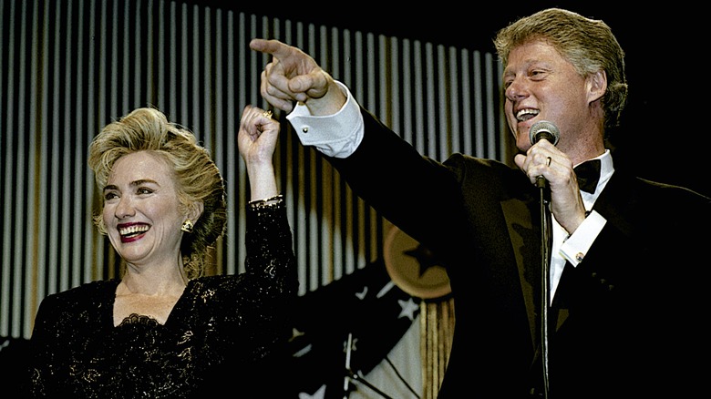 Hillary Clinton smiling alongside Bill Clinton at the DC Inaugural Ball in 1993