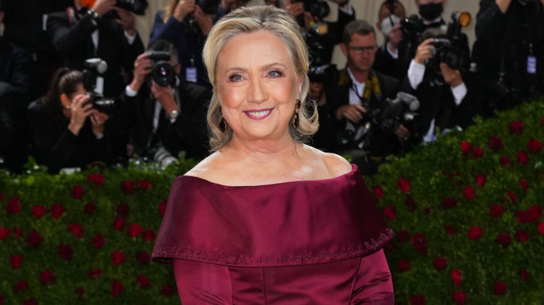 Hillary Clinton posing on the 2022 Met Gala red carpet