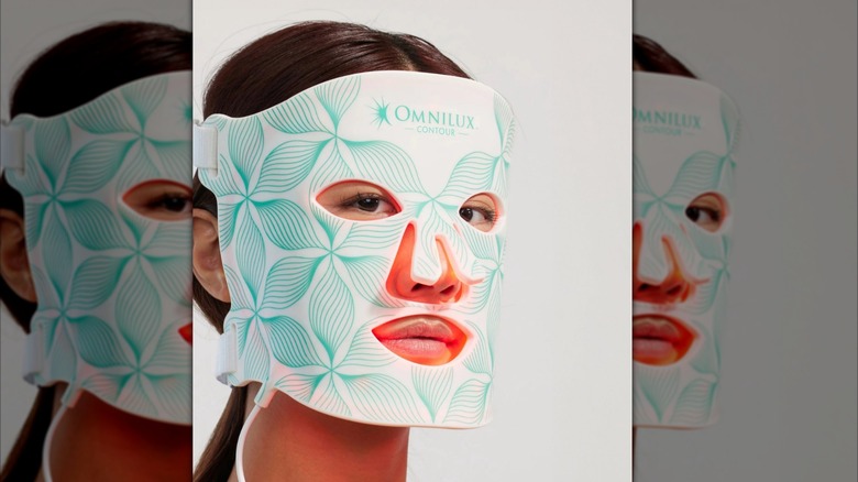 Woman with Omnilux Contour red light mask