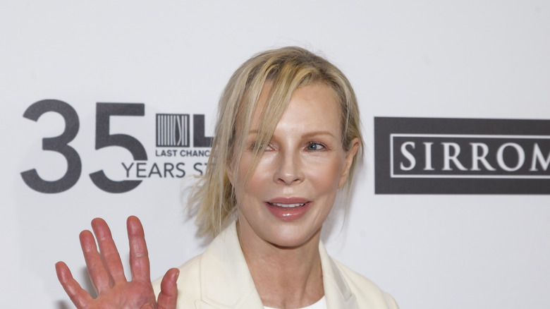 Kim Basinger waving