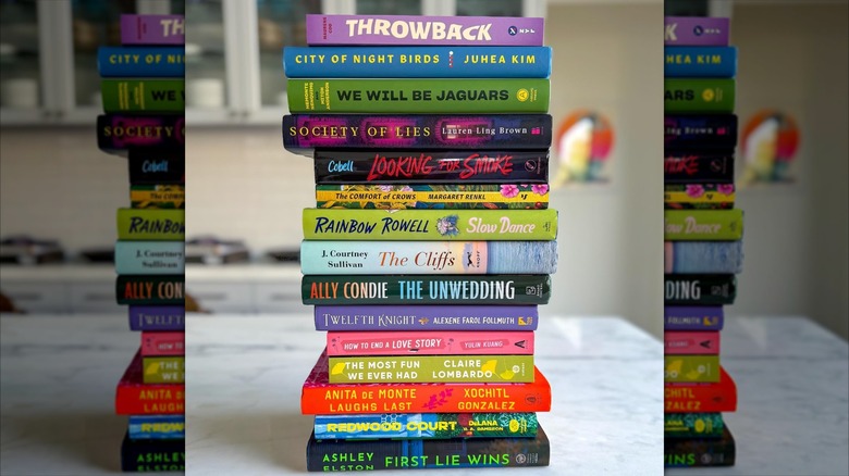 A stack of books chosen for Reese's Book Club in 2024