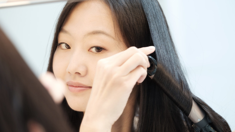 Using curling iron