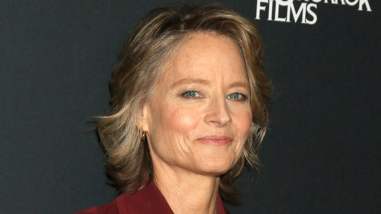 Jodie Foster smiles on the red carpet in 2024