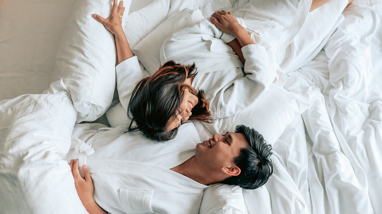 couple talking in bed