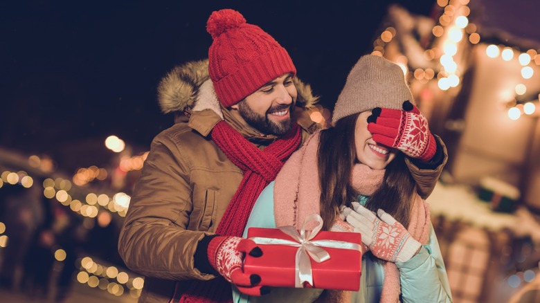 Couple swapping presents