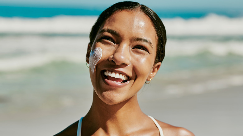 Woman with sunscreen on face