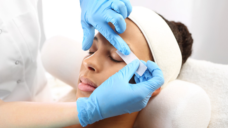 Getting eyebrows waxed