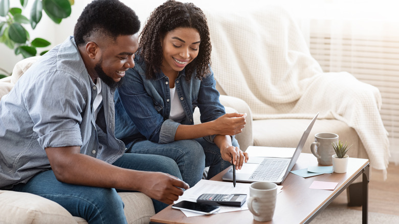 Couple planning a budget together