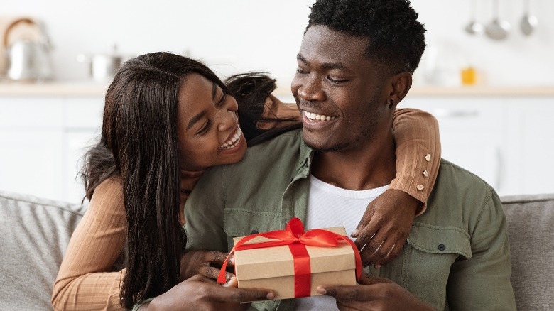 Couple exchanging gifts