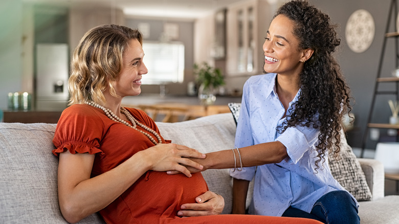 Pregnant woman with friend