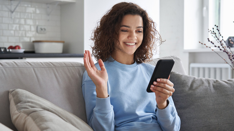 Woman smiling on the phone