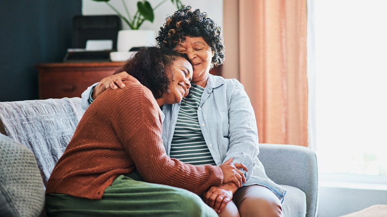 daughter hugging mom
