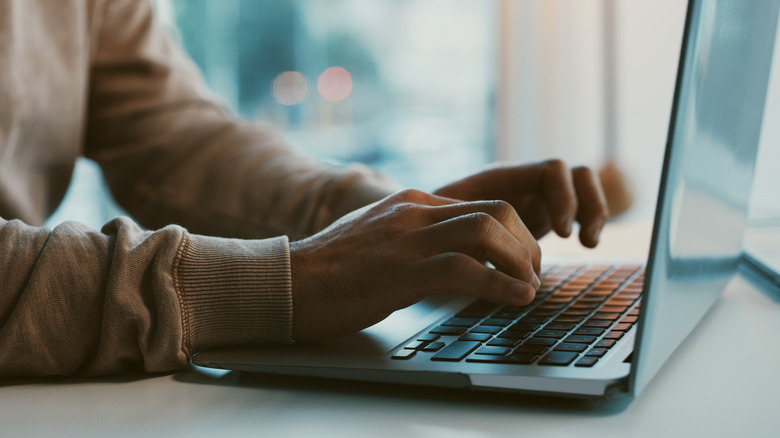 person doing research online