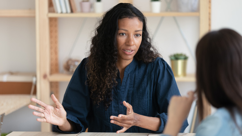 Woman speaking in an interview