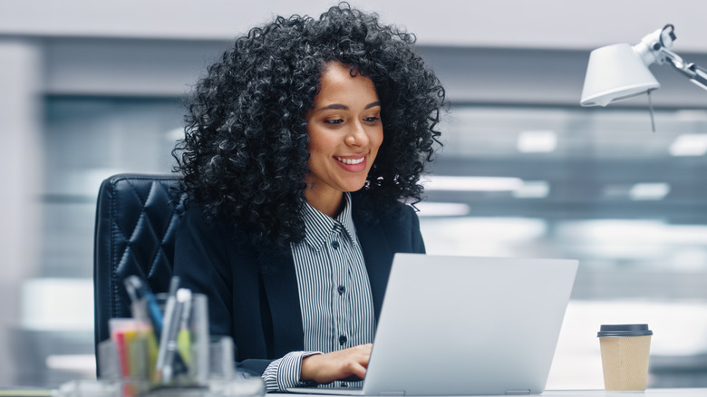 Woman sitting at her desk