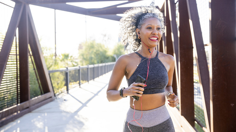 woman running in sports bra