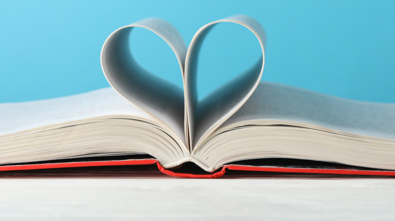 Book with page in heart shape